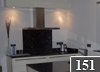 Hoogglans Snaidero keuken geplaatst in Arnemuiden, projekt 151 in Sistema Zeta Top (Bianco Everest).