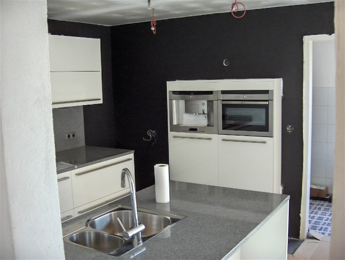 Ons werk zit er op, de keuken is klaar. Nu de schilder nog...